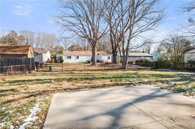 view of yard featuring a patio area and fence