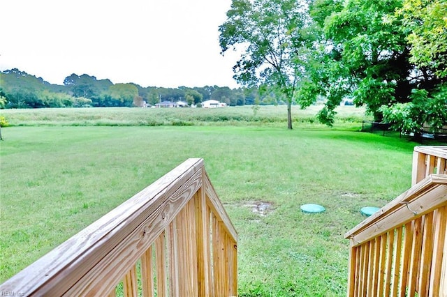 view of yard with a rural view