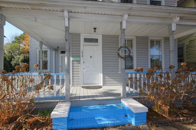 entrance to property with a porch