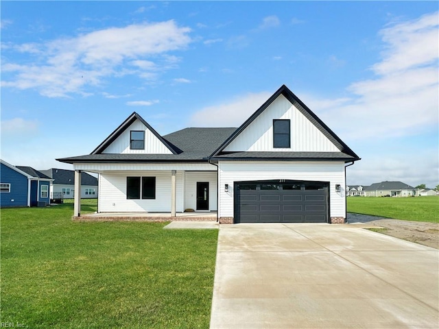 modern farmhouse style home with covered porch and a front lawn