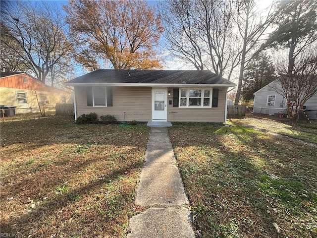 view of front facade with a front lawn