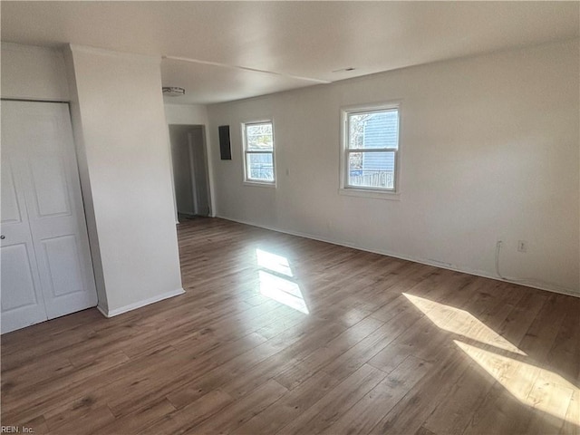 unfurnished bedroom with wood-type flooring