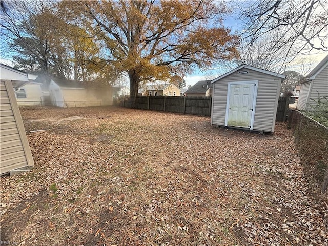 view of yard with a storage shed