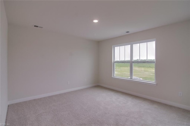 view of carpeted spare room