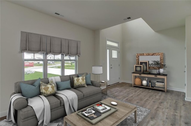 living room with light hardwood / wood-style flooring