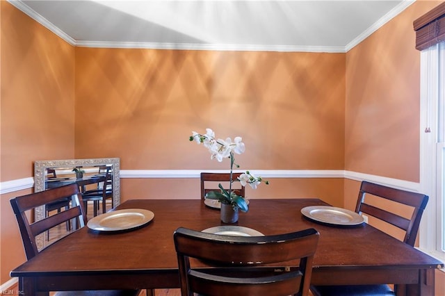 dining room with ornamental molding