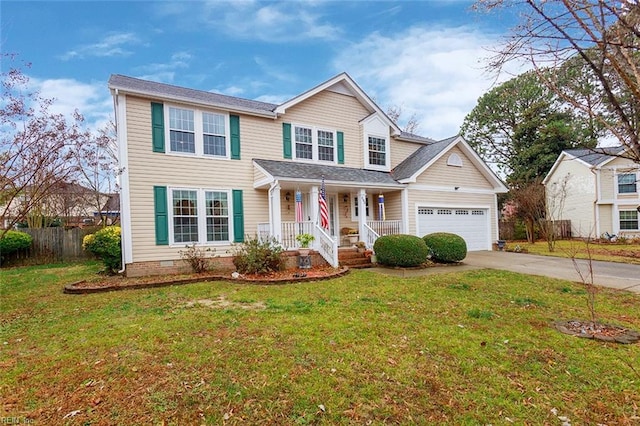 view of front of house with a garage and a front yard