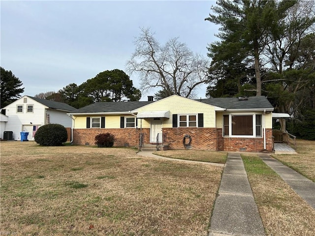 view of front of home with a front yard