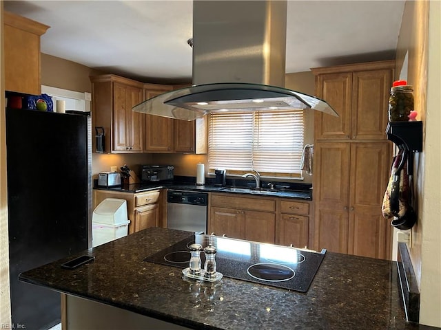 kitchen with island exhaust hood, sink, dark stone counters, and black appliances