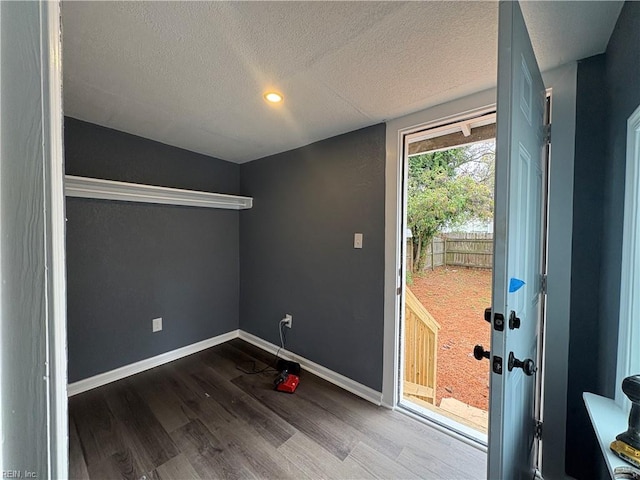 doorway to outside featuring wood-type flooring