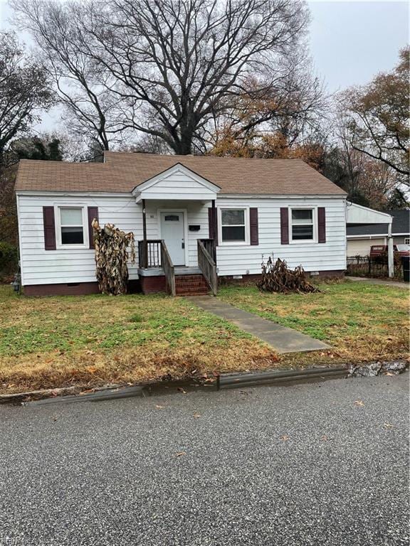 view of front of house with a front yard