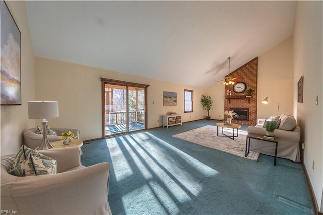 living room with ceiling fan, carpet floors, high vaulted ceiling, and a brick fireplace