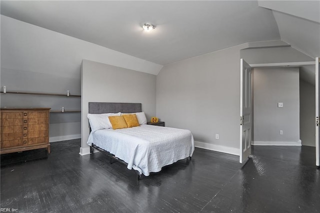 bedroom with lofted ceiling