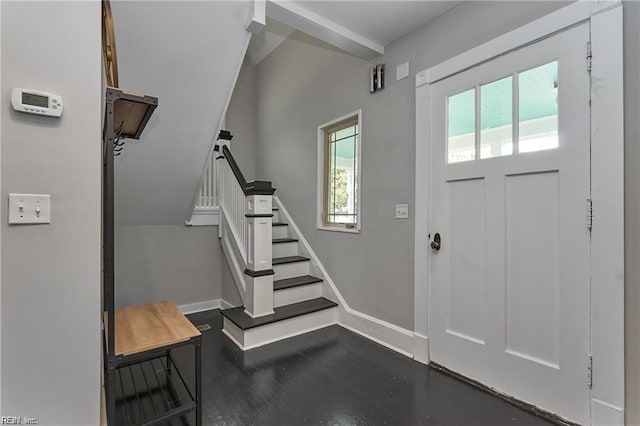 entrance foyer with lofted ceiling