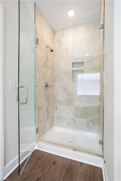 bathroom featuring an enclosed shower