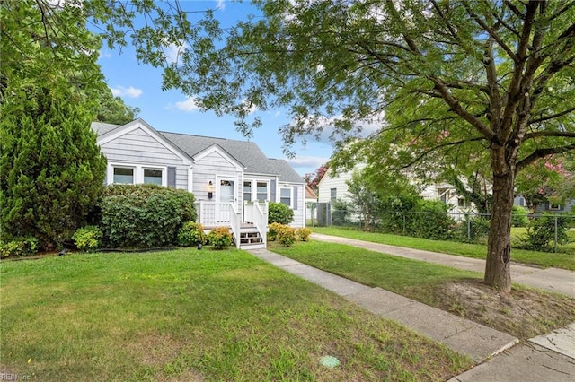 view of front of home with a front lawn