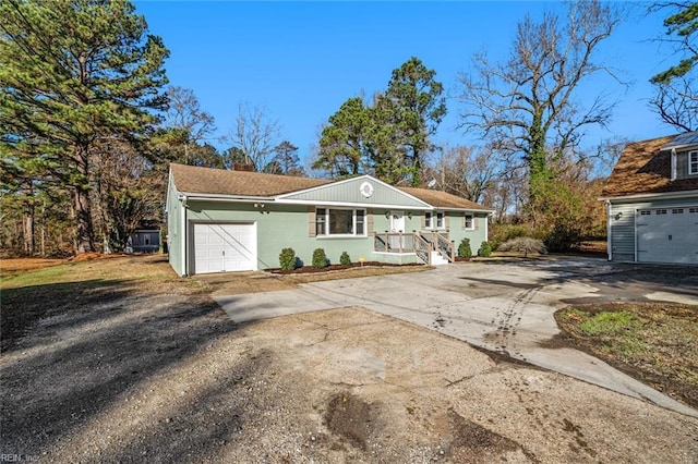 view of front of home featuring covered porch and a garage