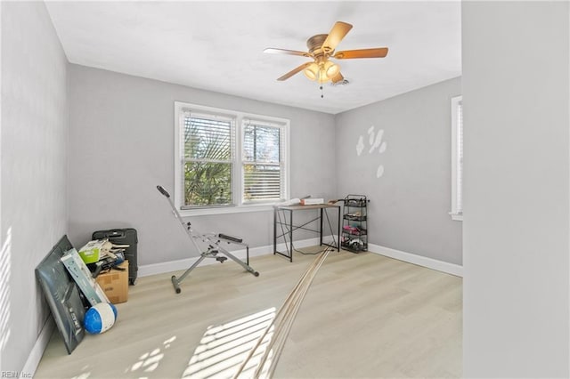 interior space with ceiling fan and light hardwood / wood-style floors