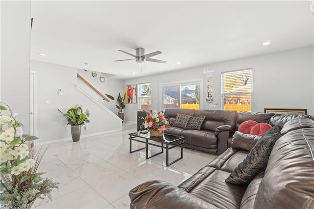 living room featuring ceiling fan