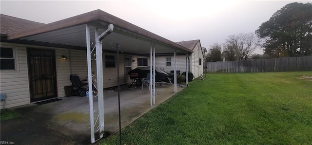 view of yard with a carport