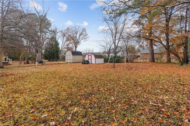 view of yard featuring a storage unit