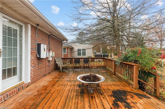 deck featuring a fire pit