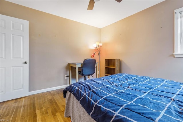 bedroom featuring ceiling fan and wood-type flooring