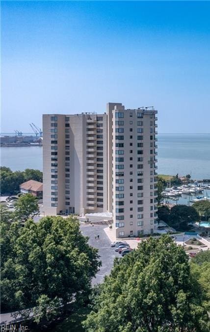 view of building exterior featuring a water view