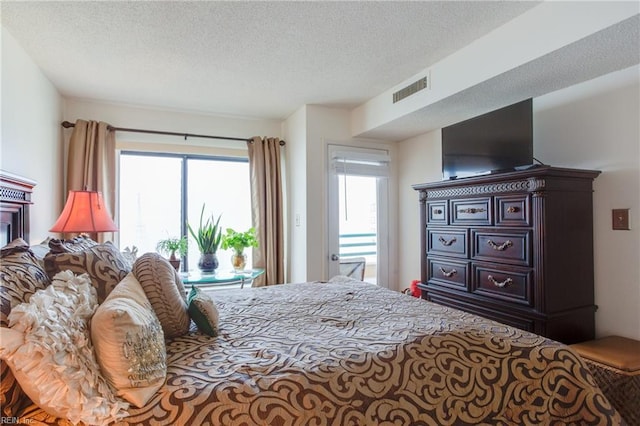 bedroom with a textured ceiling