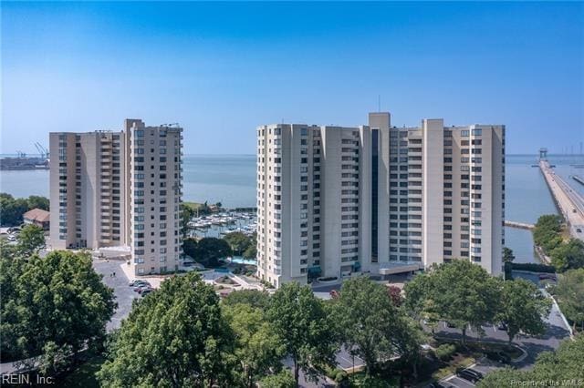 view of building exterior featuring a water view