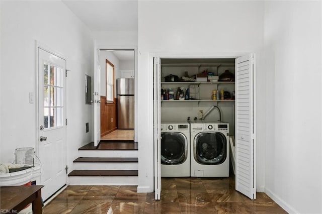 laundry area featuring washer and clothes dryer