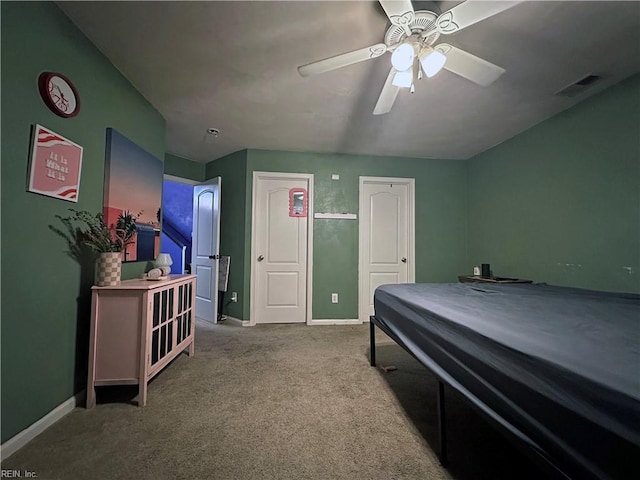 carpeted bedroom with ceiling fan