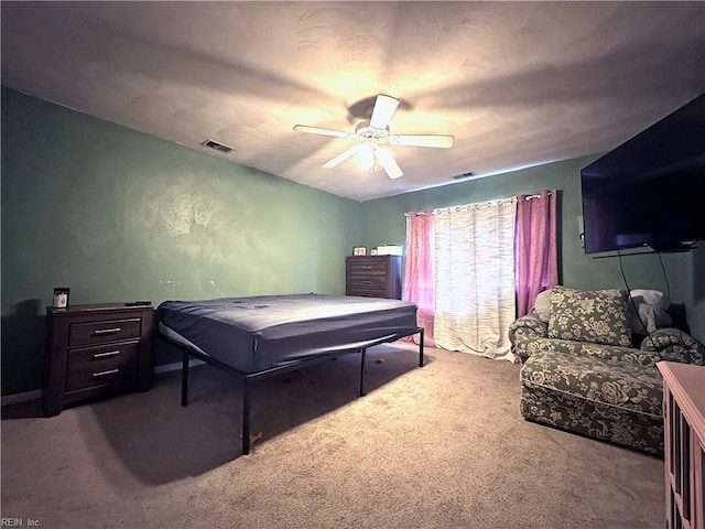 bedroom with ceiling fan and carpet floors