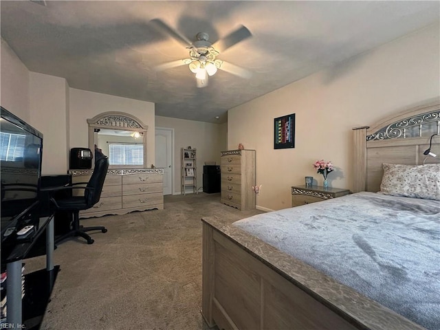 bedroom with light colored carpet and ceiling fan