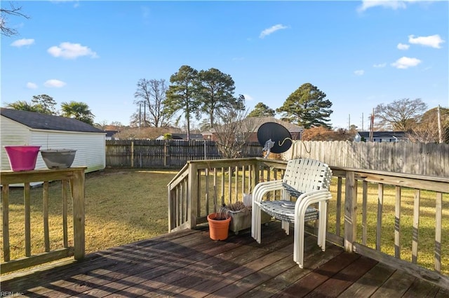 wooden deck with a yard