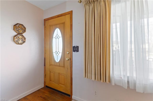 entrance foyer with hardwood / wood-style floors