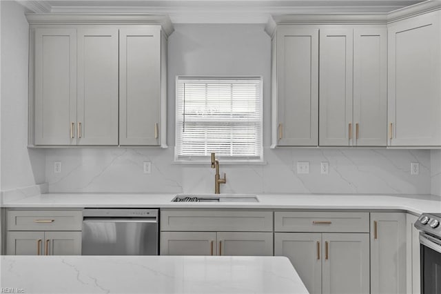 kitchen featuring decorative backsplash, light stone countertops, sink, and stainless steel appliances