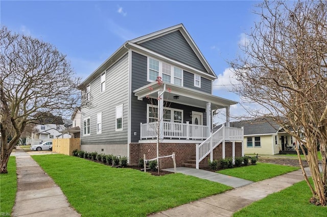 view of front of house with a front lawn and a porch