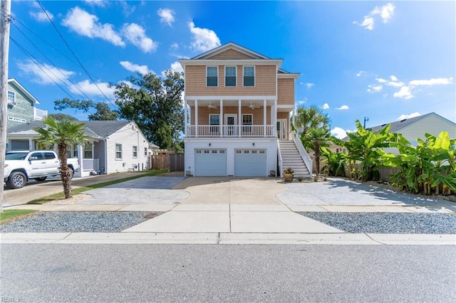 view of front of property featuring a porch and a garage