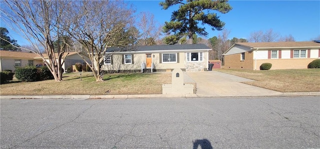 single story home featuring a front yard