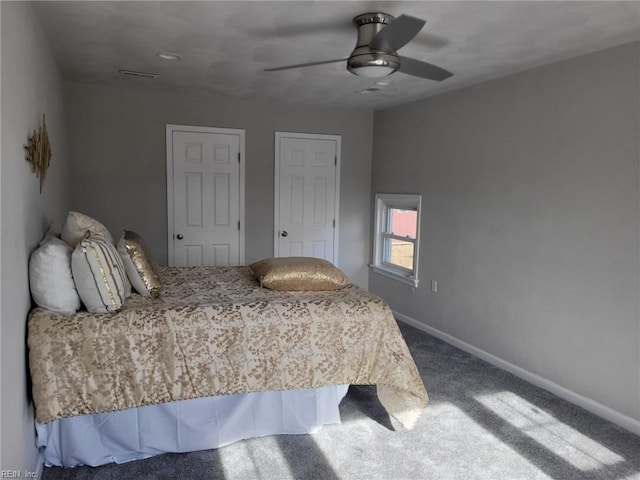 carpeted bedroom with ceiling fan