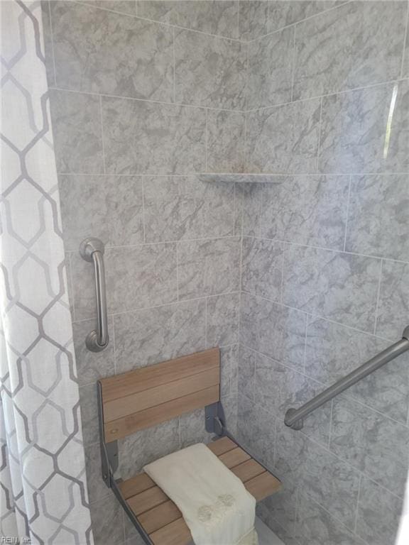 bathroom featuring walk in shower