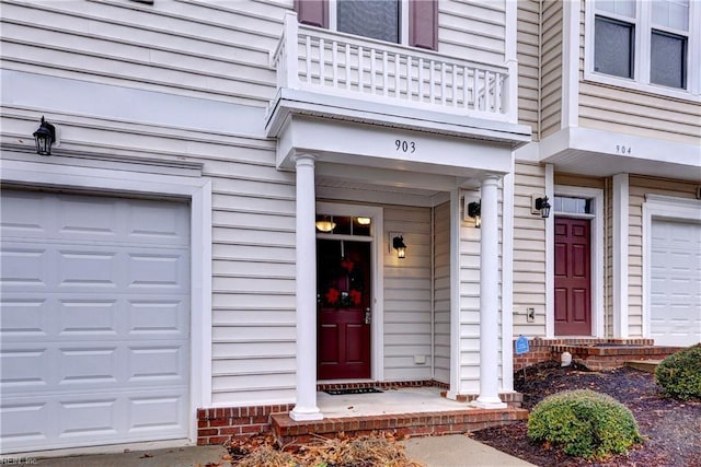 doorway to property featuring a balcony