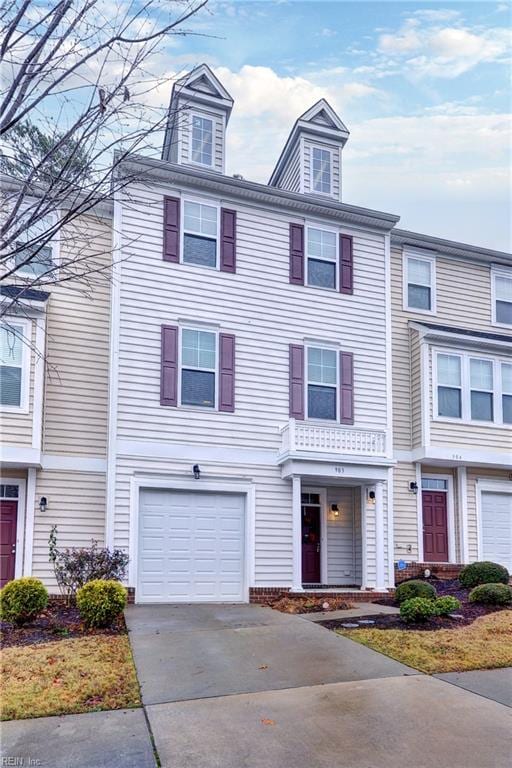 multi unit property featuring a garage