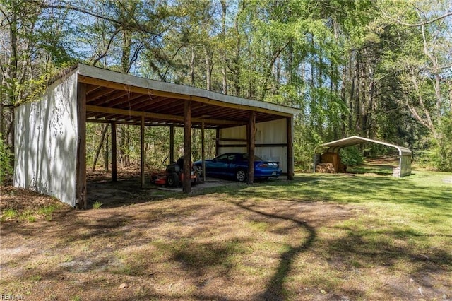 view of parking / parking lot with a lawn