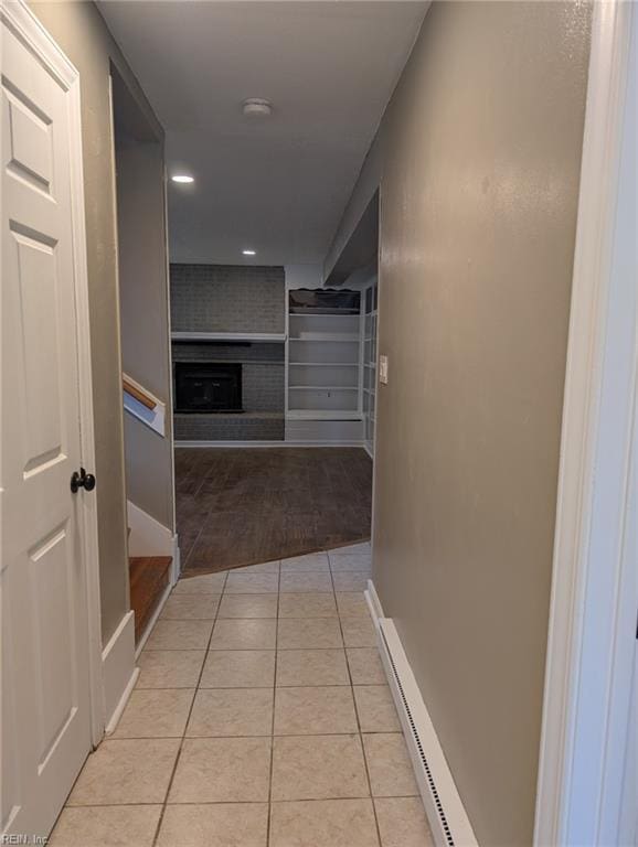 corridor with light tile patterned floors