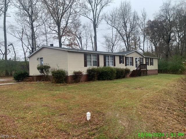 105 Chambliss Rd, Emporia, VA 23847 - manufactured / mobile home featuring a front lawn and crawl space