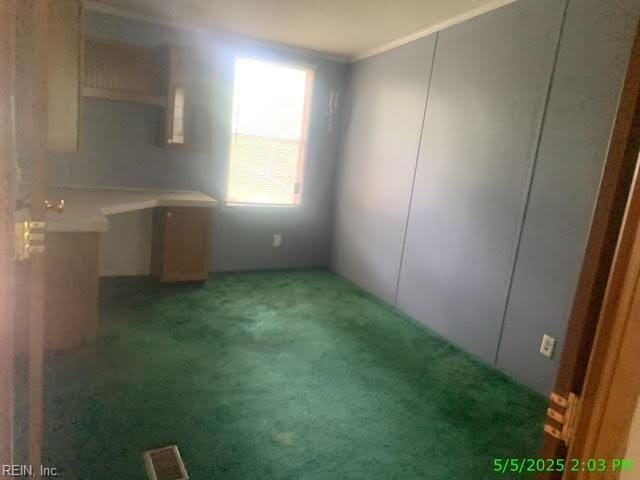 105 Chambliss Rd, Emporia, VA 23847 - interior space with ornamental molding and light colored carpet