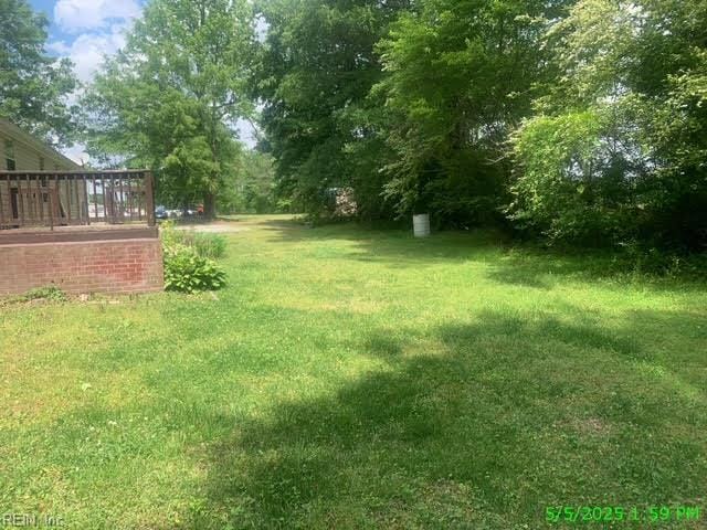 105 Chambliss Rd, Emporia, VA 23847 - view of green lawn featuring a wooden deck