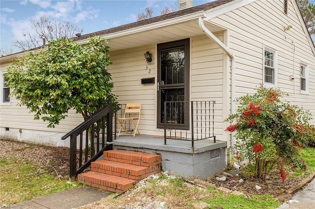 property entrance featuring a porch